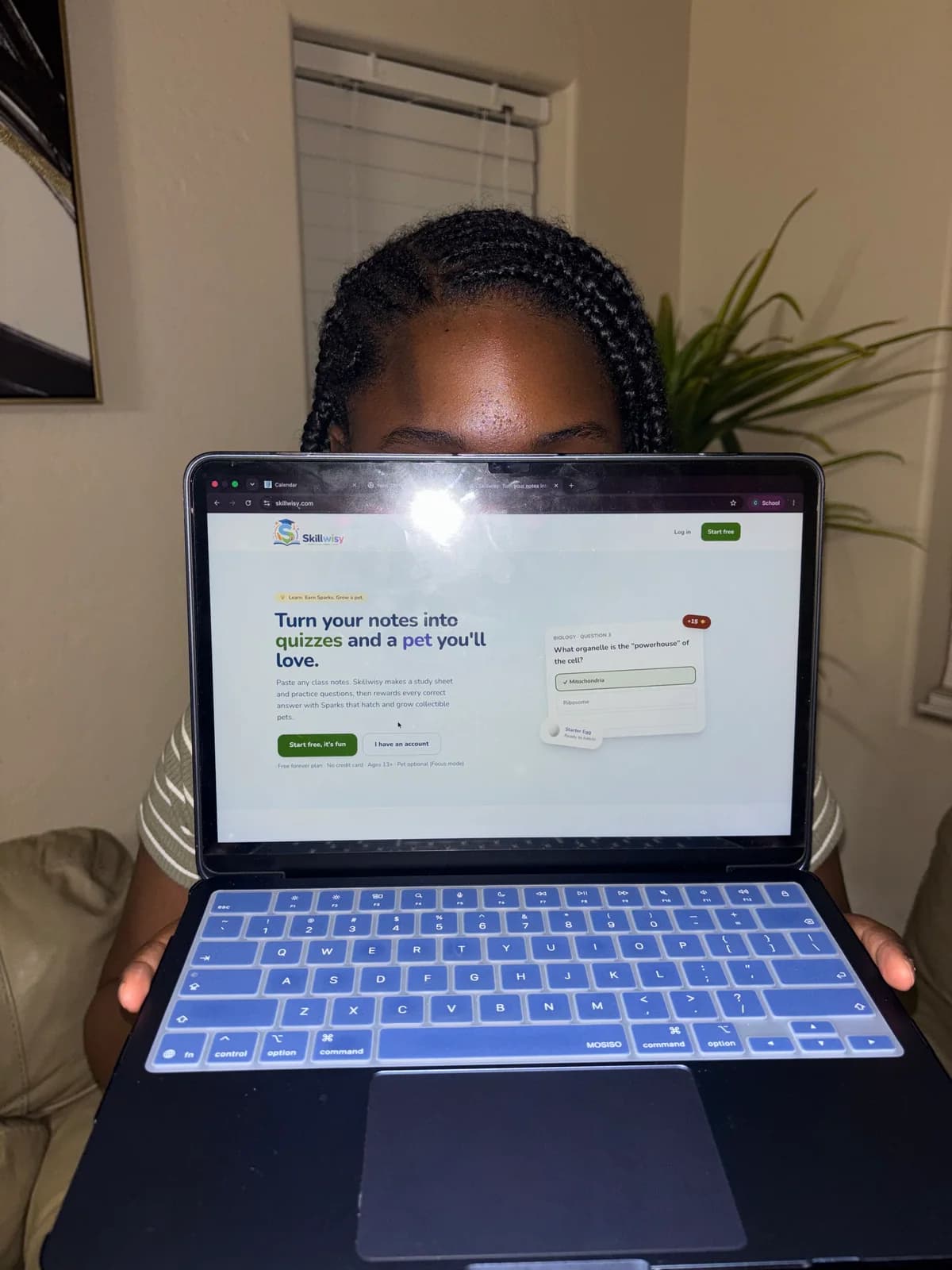 I hold a laptop displaying the Skillwisy app I created